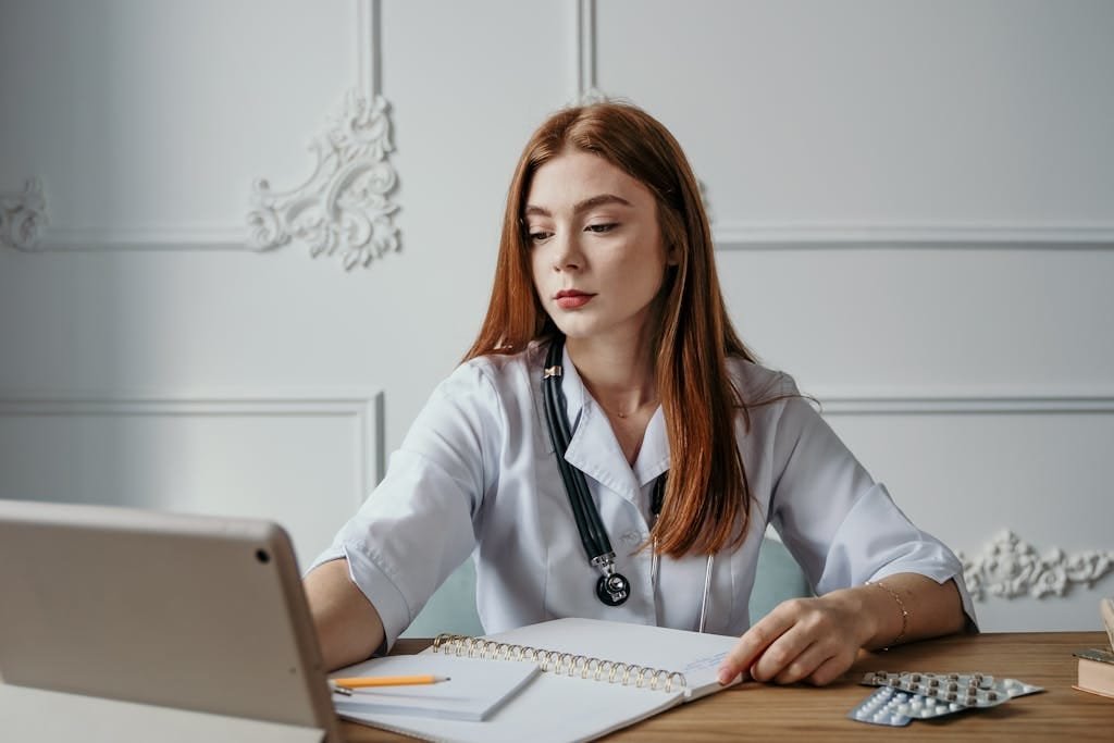 Clinical Research Coordinator managing patient data in a clinical trial.